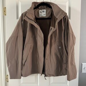 Brown hooded rain jacket